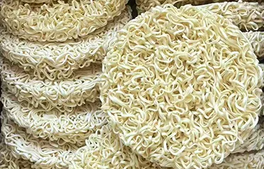 Dlaczego bloki z makaronem błyskawicznym firmy Qinhuangdao Dongyang Food Co., Ltd. są eksportowane luzem do wielu krajów na całym świecie?